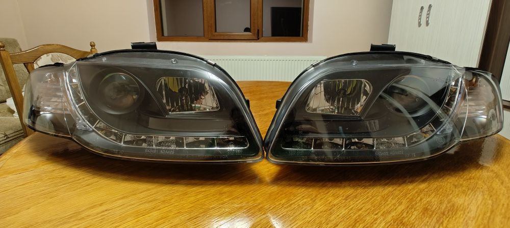 Faruri led cu lupa audi a4 b7 aftermarket