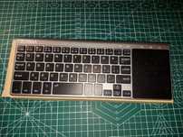 Tastatură wireless cu touchpad