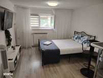 Central-Garsoniera - bloc  apartamente mobilata modern ,pret 300Euro