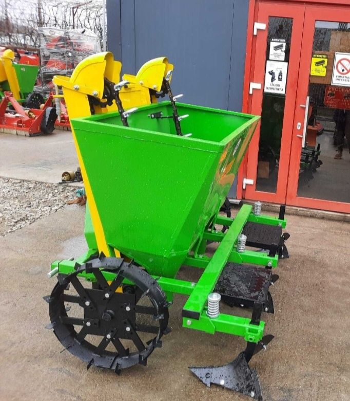 Masina de pus cartofi 2 randuri+fertilizator