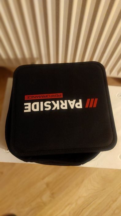 Trusa panza Parkside cu acumulator, incarcator, burghie, biti