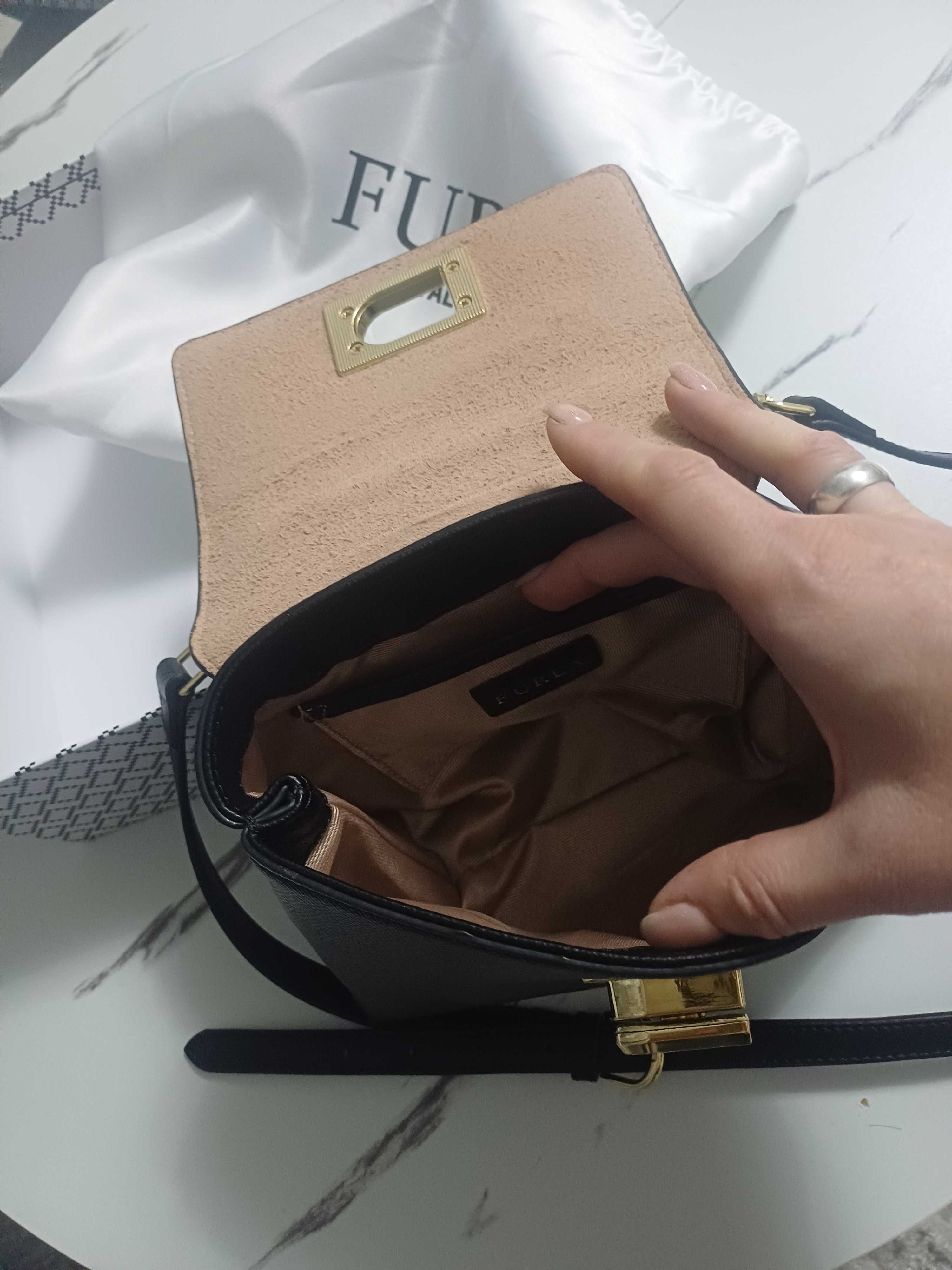 Продам женскую сумку Furla