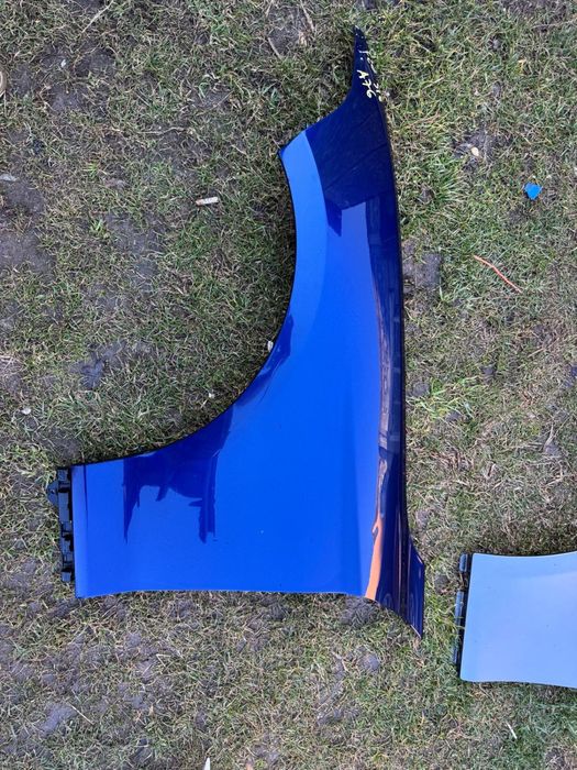 Aripa stanga fata BMW F20 cod culoare A76 albastru