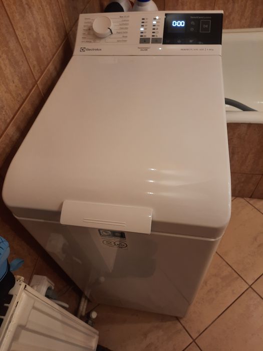 Masina de spălat verticala rufe