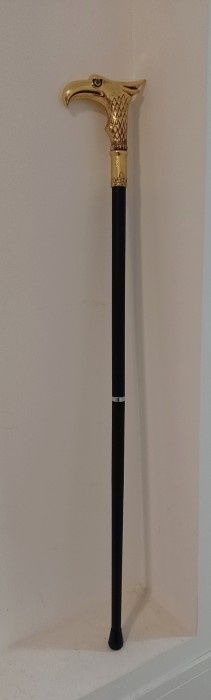 Baston cu mâner cap de vultur din bronz ,piesa cu o lucrătură de o foa