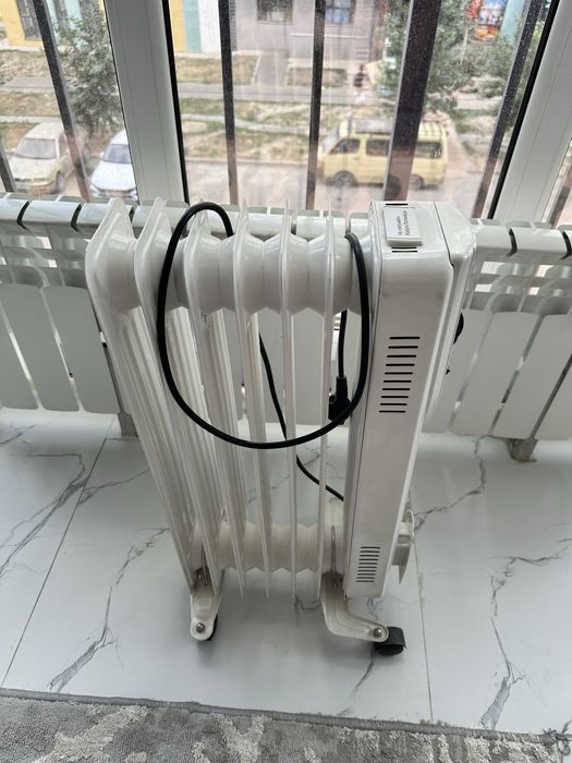 Масляный обогреватель