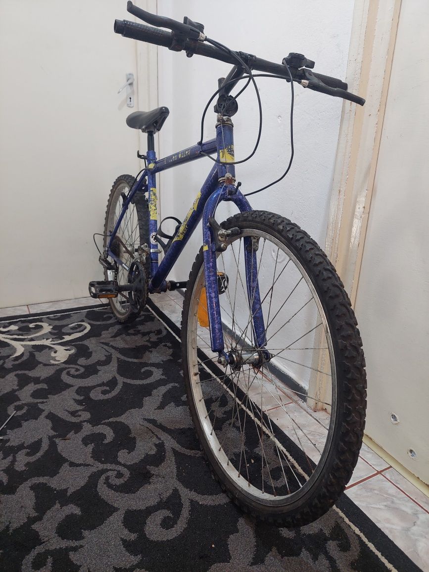 Vând bicicleta adult  pe  26