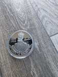 Moneda de colecție / capsulată