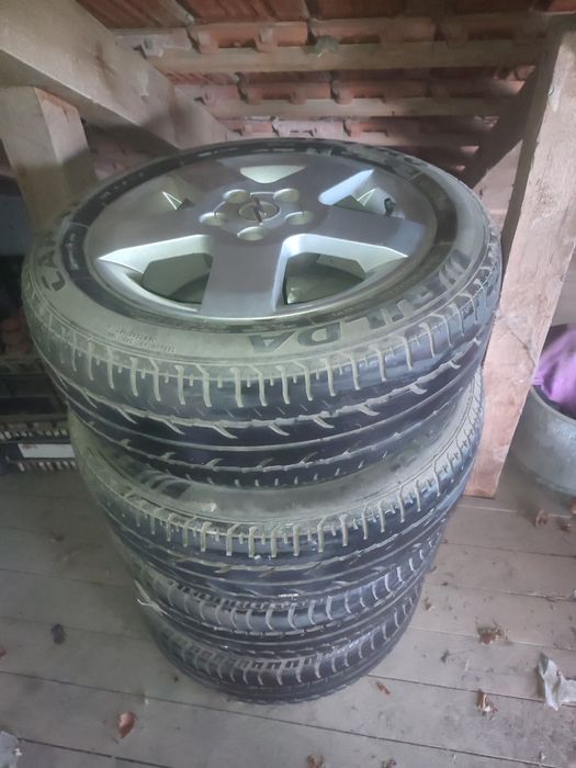 Vând roti de Opel jenți și cauciucuri