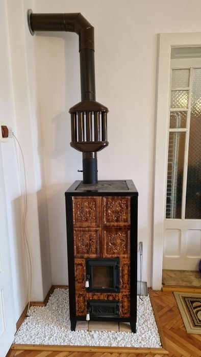 Vând sobă din teracota 4 rânduri, cadrul de otel cu ușa sticlă