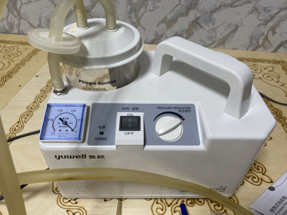 Аспиратор мокроты Yuwell 7E‑A (портативный отсасыватель)