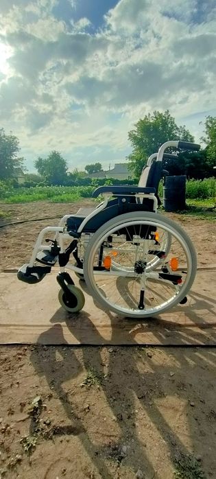 Инвалидная коляска