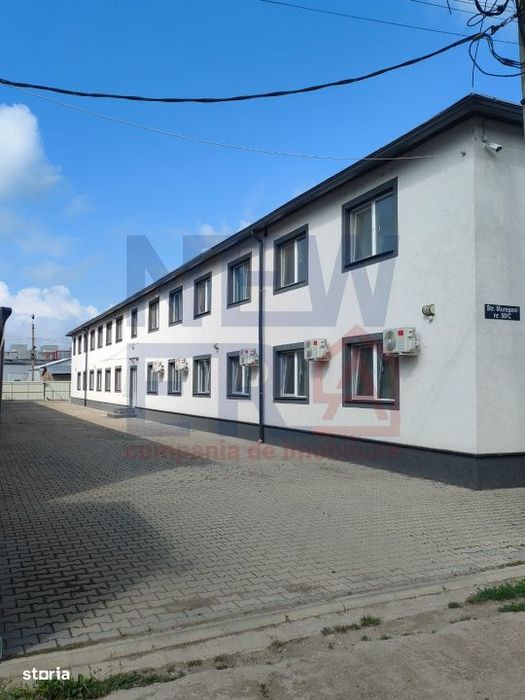 Cladire multifunctionala de vanzare – 24 locuinte, curte, randament