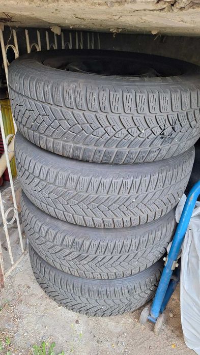 Roti Jante tabla + anvelope iarna + capace VW Passat 215 60 R16