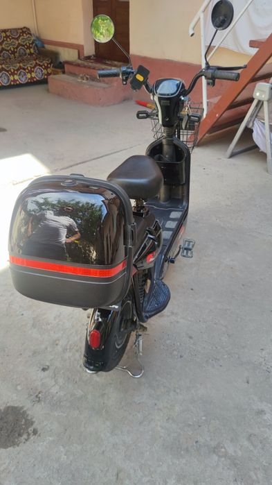 Скутер черный пантера бонви