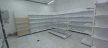 Стелажи полки для магазина торговое оборудование ветрины островные