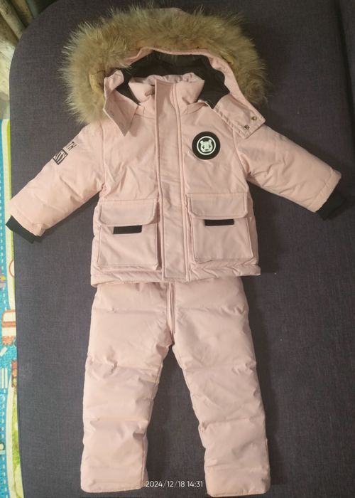 Продам новый зимний комбинезон