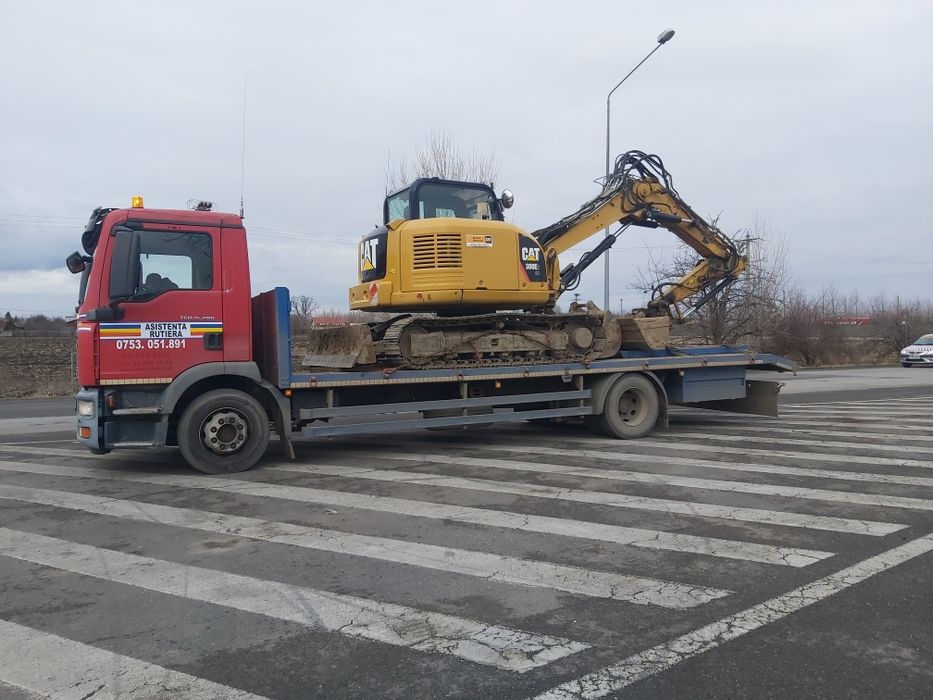 Transport buldo excavatoare,utilaje,tractoare,inchiriez platforma trai