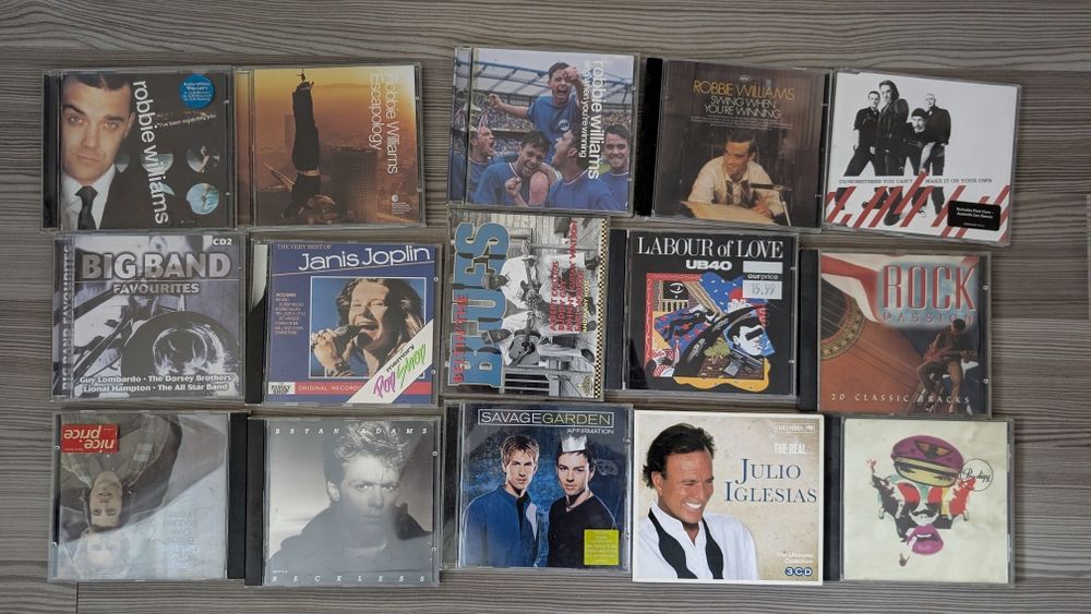 Cd-uri audio cu muzica rock și pop