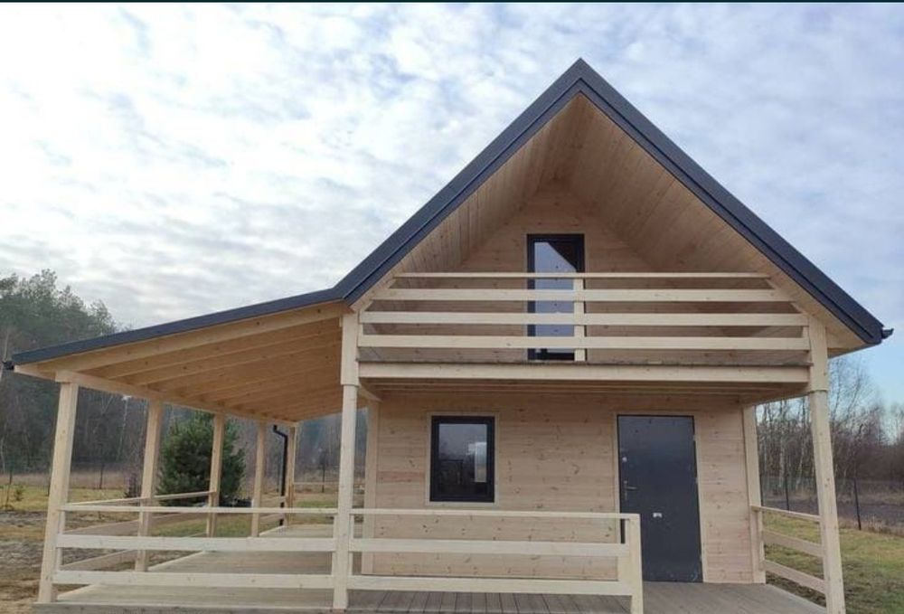 Case din lem la cheie