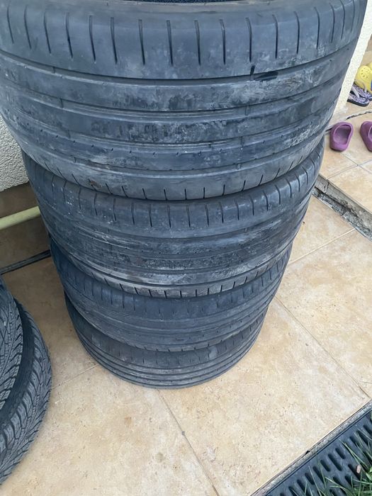 Vind set anvelope vara Dunlop in doua marimi , se vad pe geanta ,