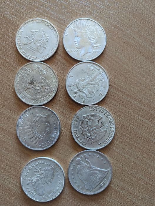 Монети one dollar