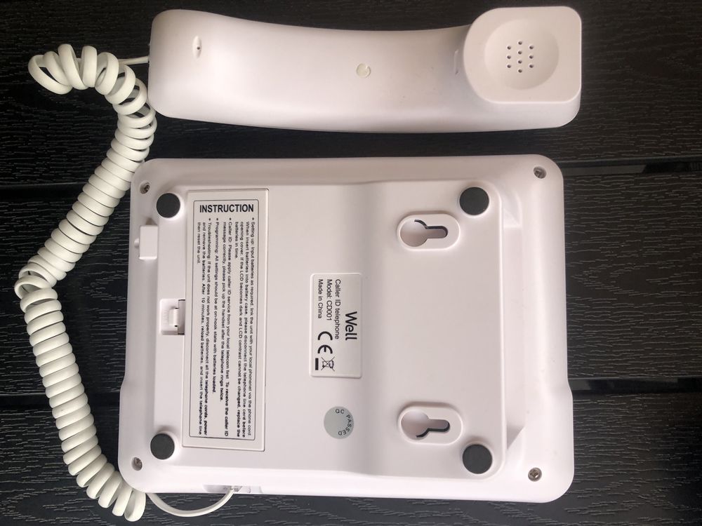 Ofer la vanzare 2 telefon noi WELL ,alb si negru, model CD001