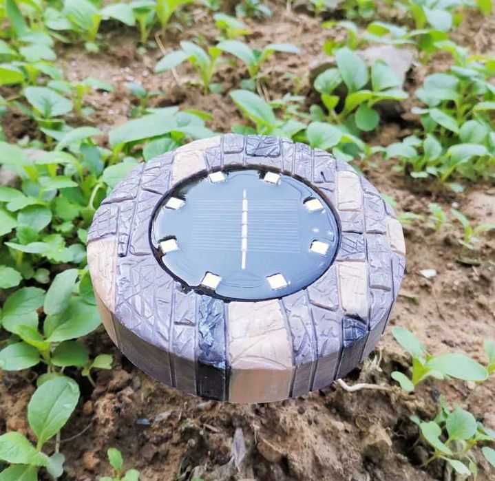 Set 4 lampi solare cu aspect de piatra cu 8 LED-uri