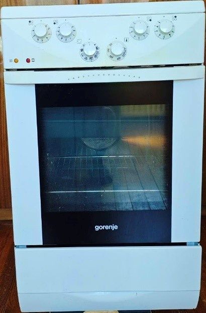 Готварска печка Gorenje с керамичен плот и вентилаторна фурна – 60 лв.