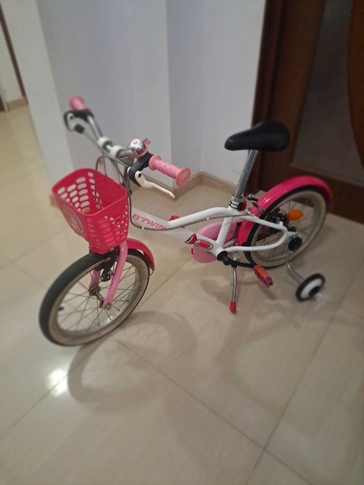 Bicicleta BTwin roz  pentru copii 4 - 8  ani