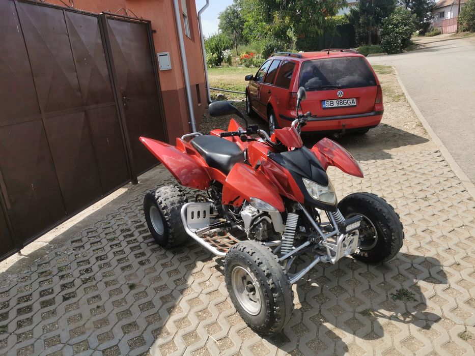 Vând quad access