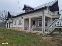 Casă cu garaj și teren de 1000 mp, la preț accesibil