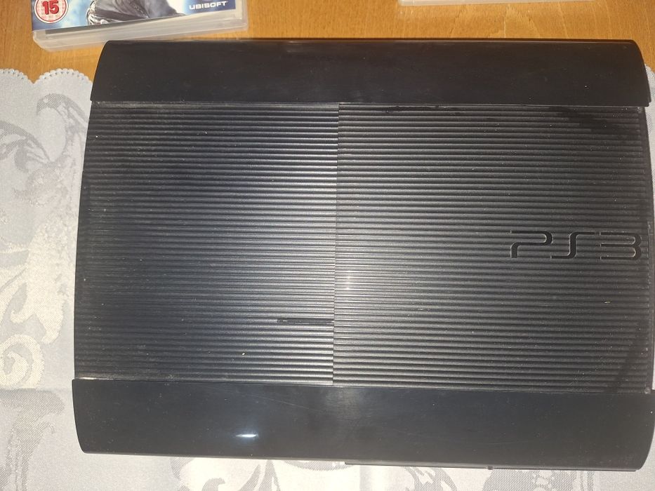 PlayStation3 с игри и контролер