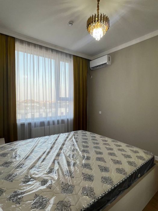 Сдаю квартиру в Мирза-Улугбекском районе Шахриобод новострой 2х комнат