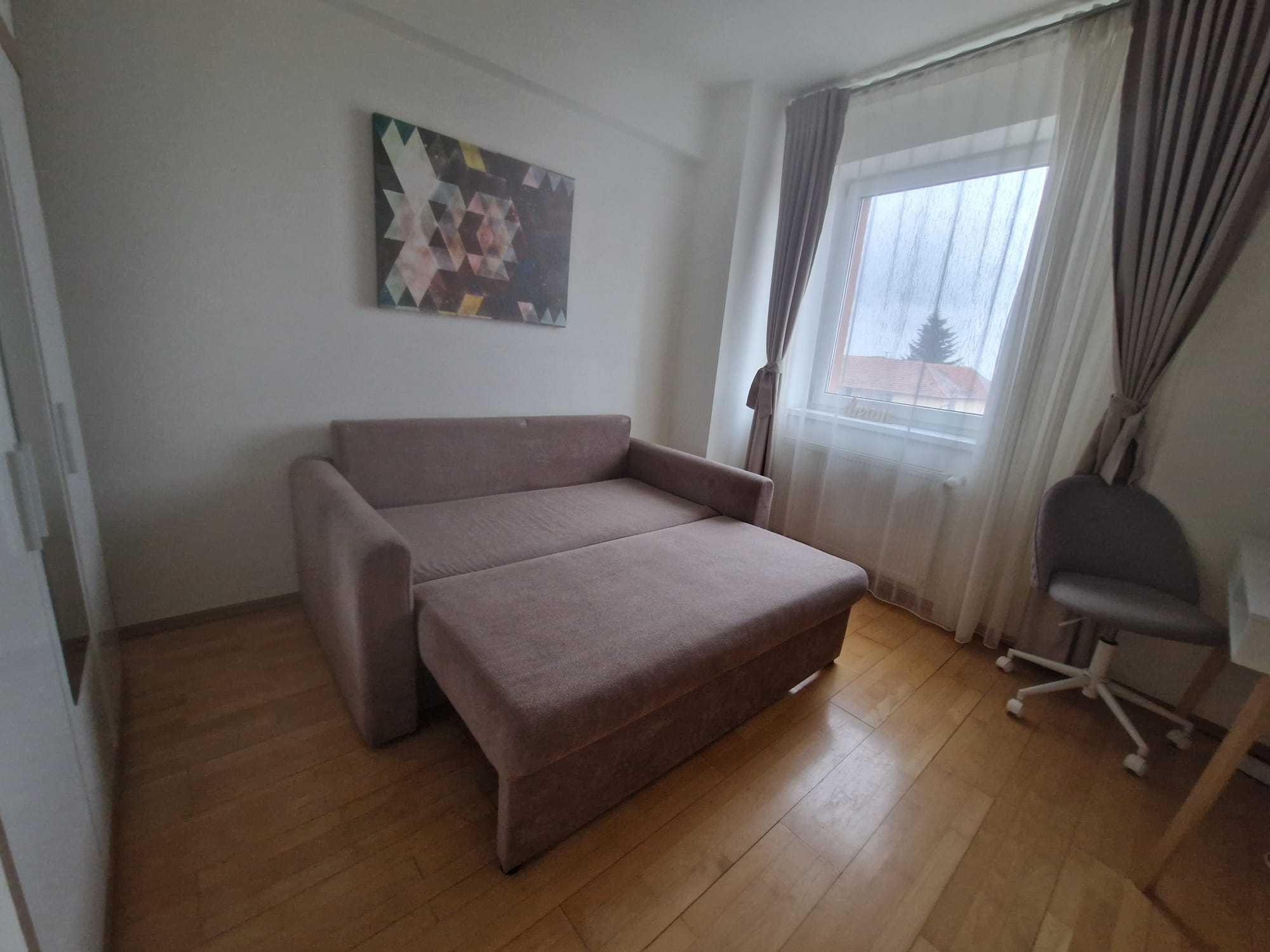 Canapea 2 locuri extensibila in doua variante de culori; Lila si Bej