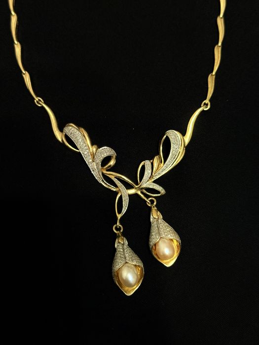 Продам золотой колье бриллиантовый