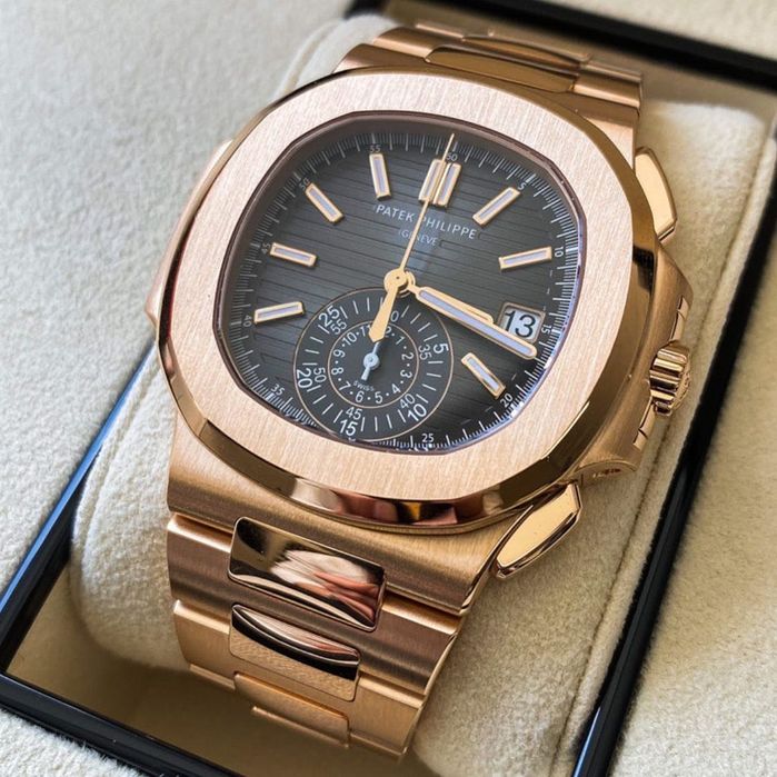 Часовници Rolex , Patek Philippe