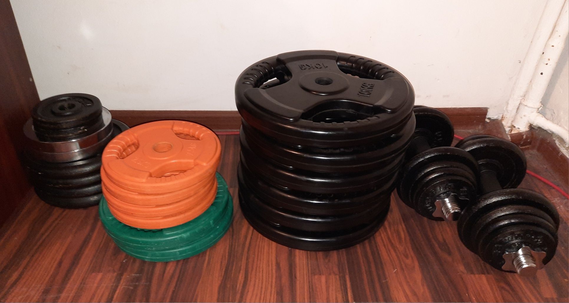 Set  discuri din fonta cauciucate cu grip 2 x 10 kg gantere / haltere