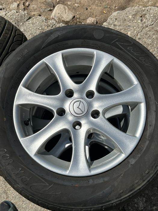 4бр. Алуминиеви джанти с гуми 195/65 R15 цола от Mazda