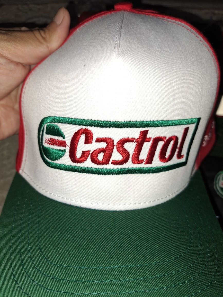 Кепки Castrol новые.