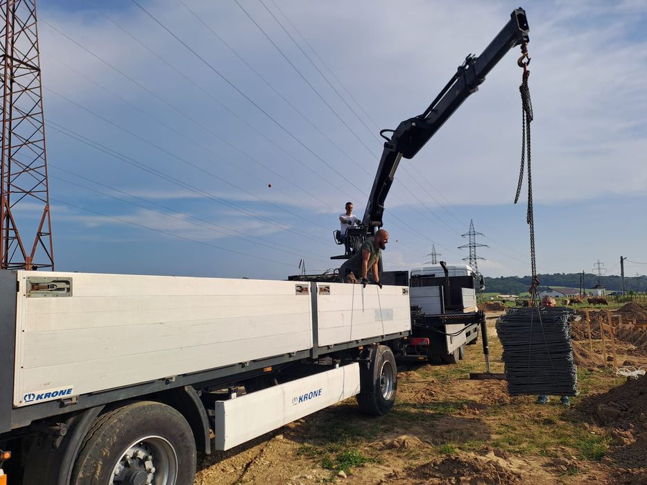 Transport materiale construcții cu macara