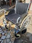 Scaun cu rotii dezabilitati