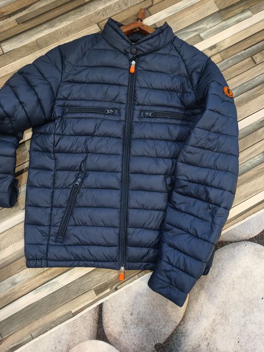 Олекотено зимно яке, оригинално; якето е като ново; реалната цена е в