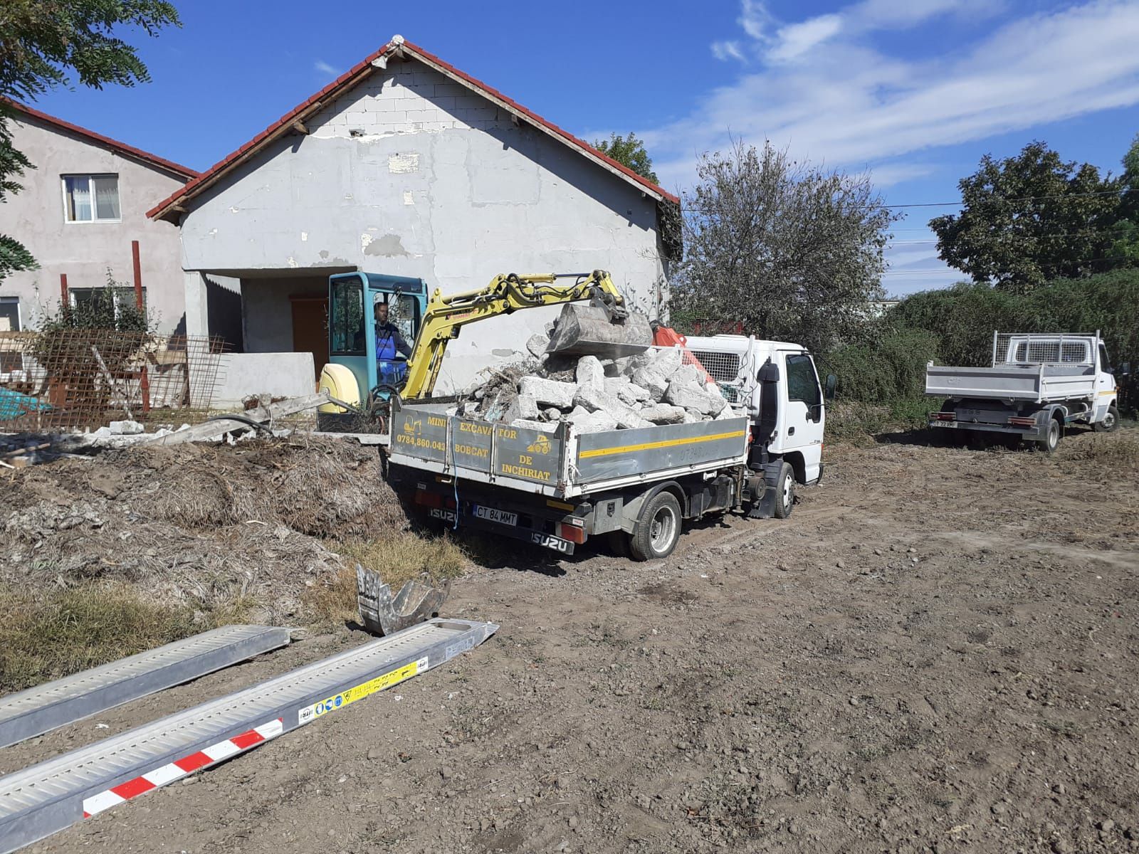 sapaturi bobcat miniexcavator moloz