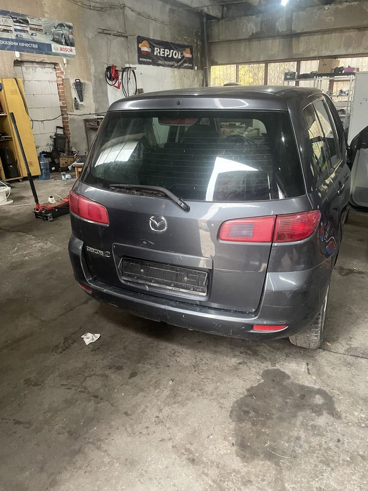 Mazda 2 - на части
