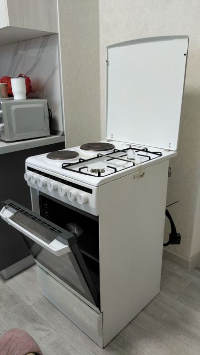 Продам комбинированную газоэлектроплиту Hansa