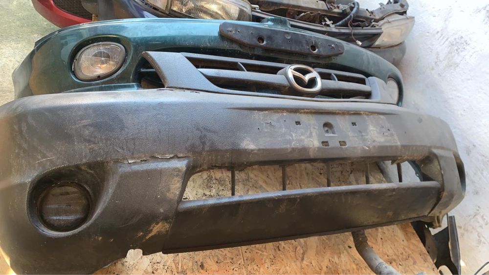 Бампер Мазда Трибут