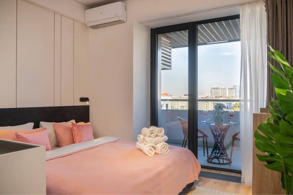 Современная посуточная уютная студия со своей парковкой в NRG U Tower