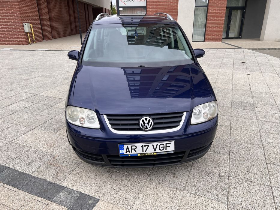 Vand sau schimb vw turan dsg 7 locuri