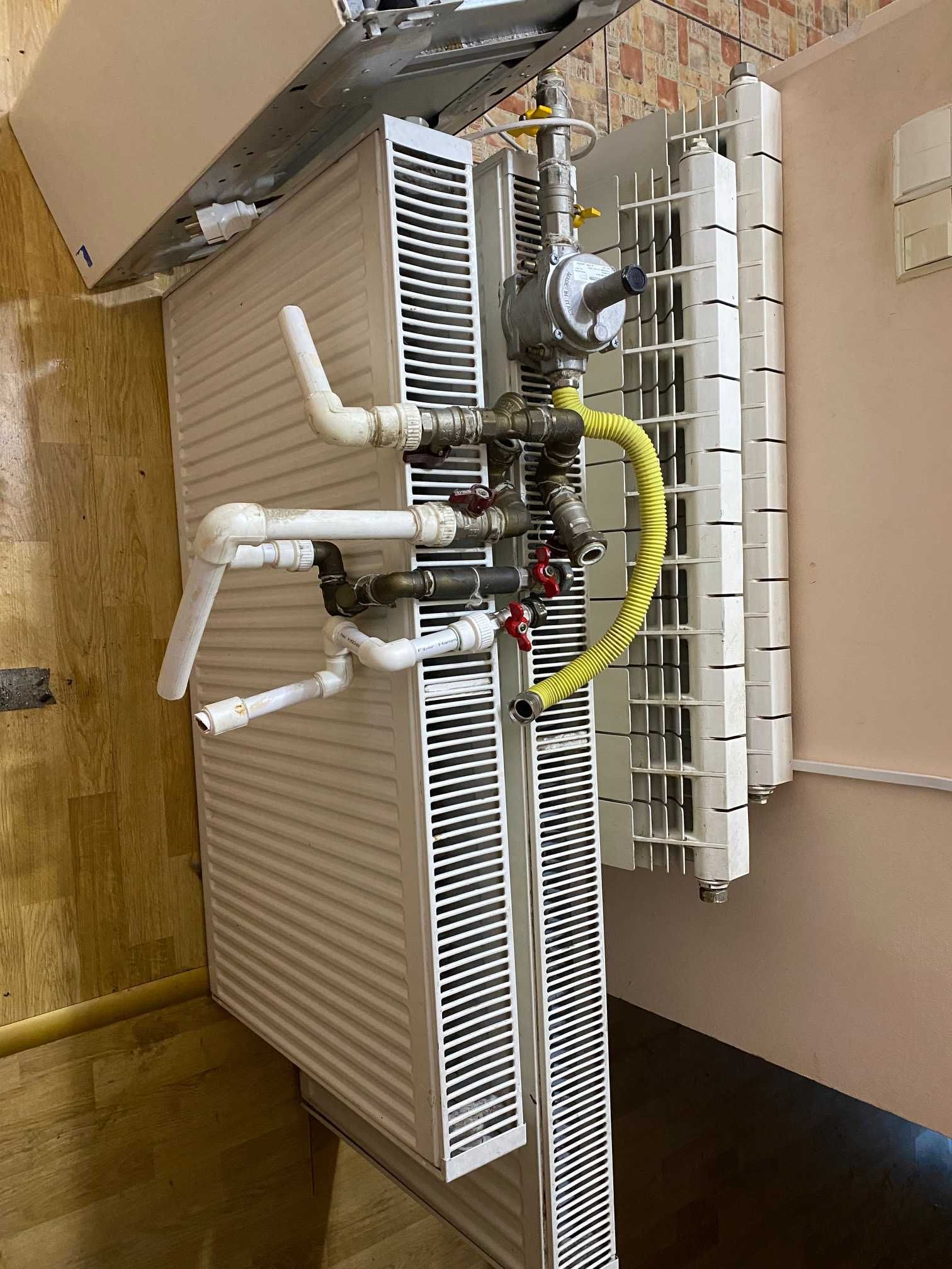 Centrala termica 24 kw, calorifere aluminiu și oțel